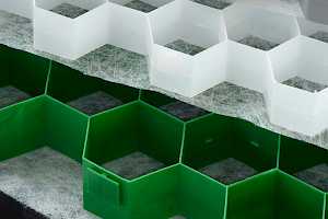 CORE Gravel panels’ honeycomb structure makes the system strong enough to support vehicles.